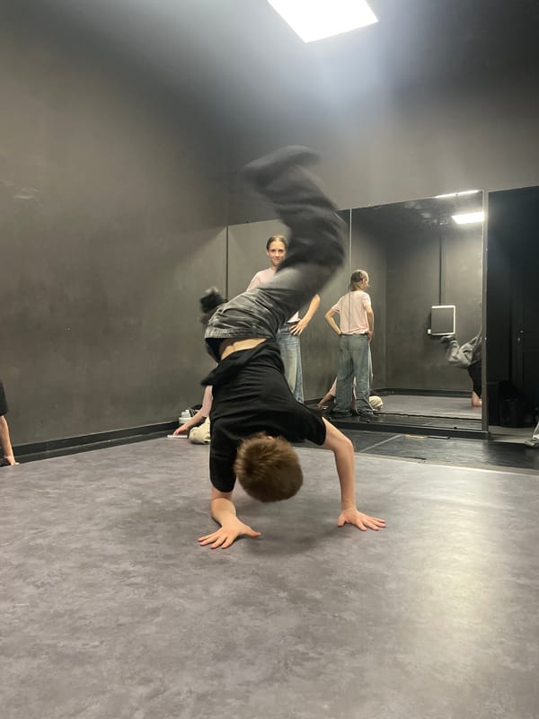 Breakdancers practice acrobatic moves in Krasnoyarsk studio
