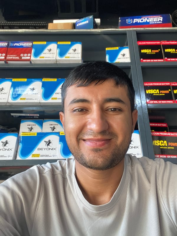 Man photographed at car battery shop in Bukhara