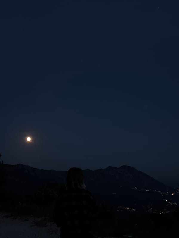Full moon observed over Montenegro mountains at dusk