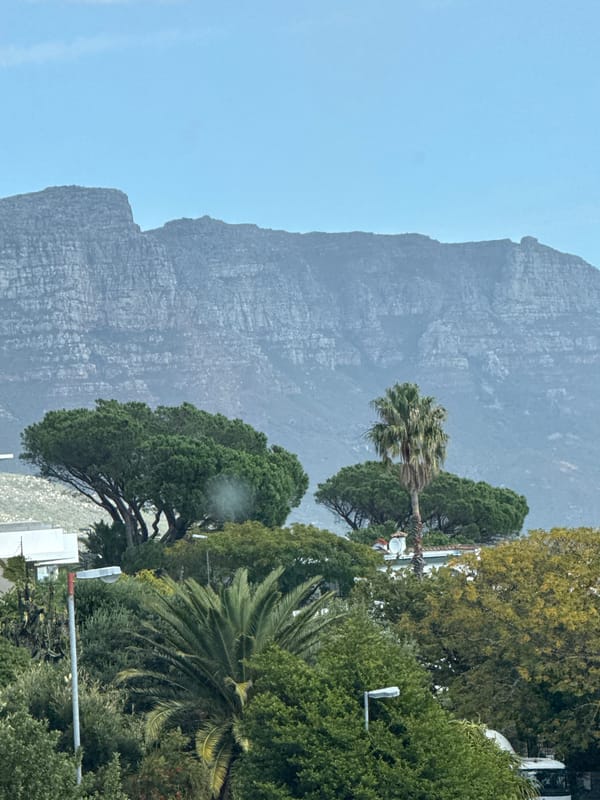 Scenic Cape Town landmarks observed, parachutist spotted near mountains