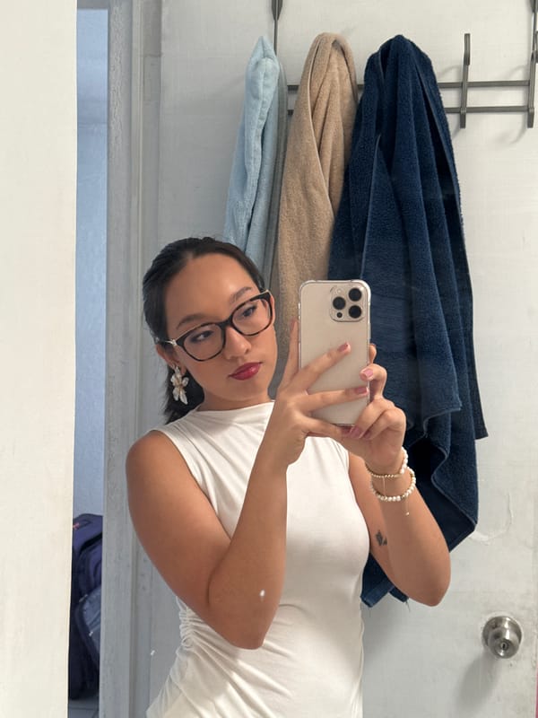 Woman takes bathroom selfie in Puebla, Mexico