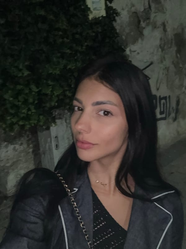 Woman visits late-night bakery in Plovdiv, Bulgaria