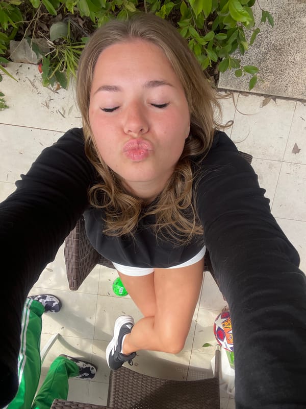 Woman enjoys outdoor meal in Krimovice, Montenegro