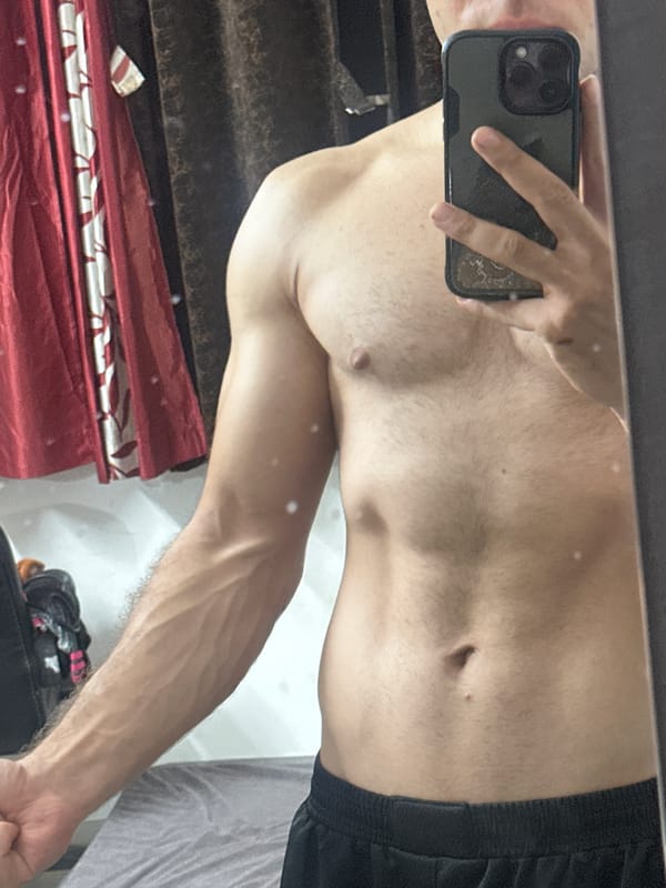 Mirror selfie session with SpongeBob plush toy in Pune