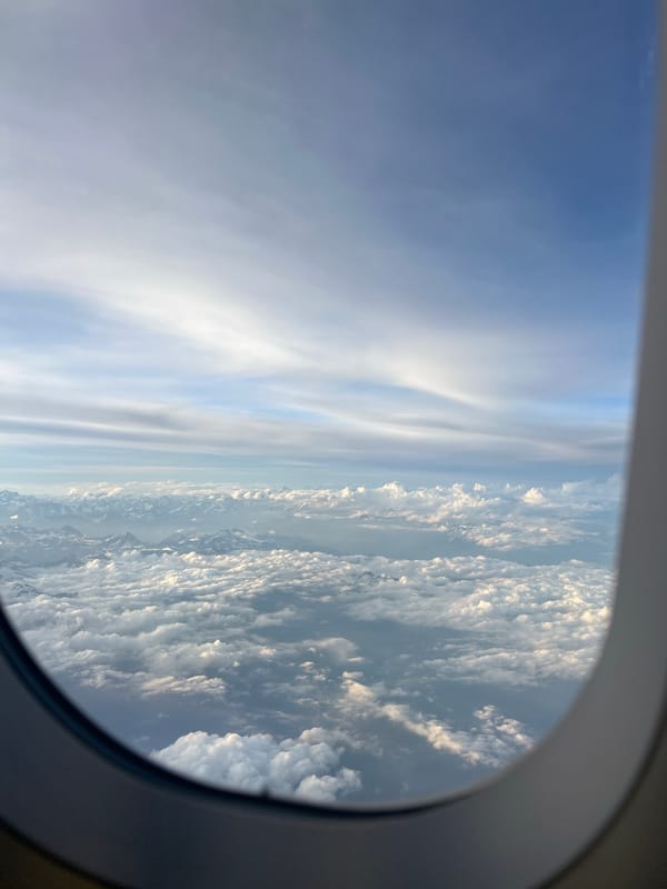 Woman documented traveling through Segrate, Italy during evening hours