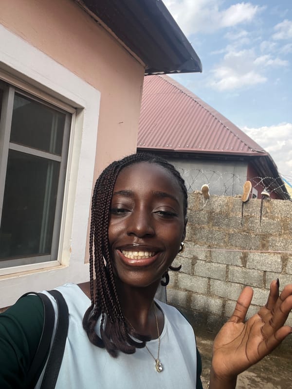 Woman takes selfie photo session in Abuja residential area