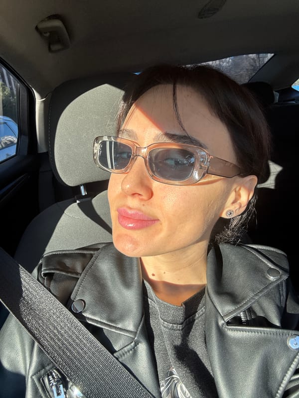 Woman takes car selfies in Tbilisi