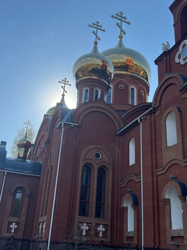 Orthodox church with golden domes observed in Chaikovsky, Russia