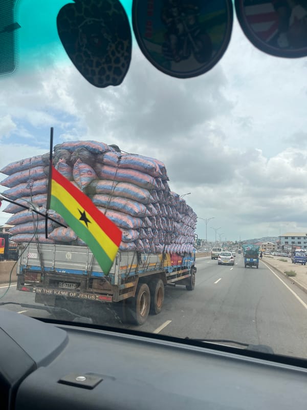 Overloaded truck with Ghanaian flag travels Sowutuom highway