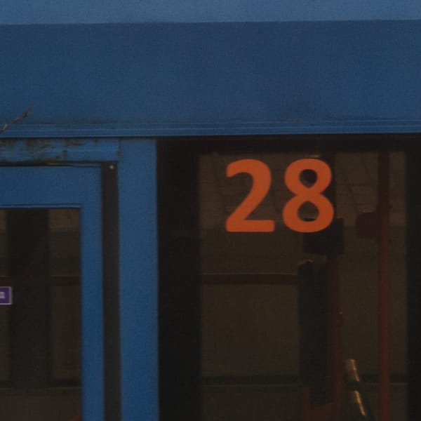 Illuminated number 28 spotted on blue building in Hrodna