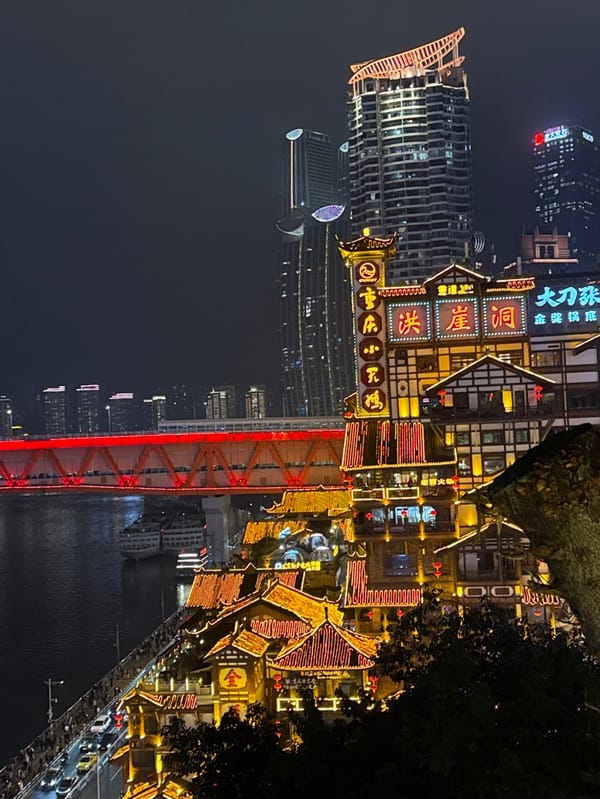 Tourists flock to illuminated Hongyadong complex in Chongqing