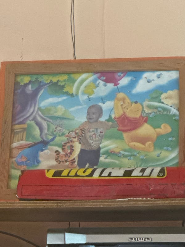 Indoor display of toys, artwork and certificate in El Maco