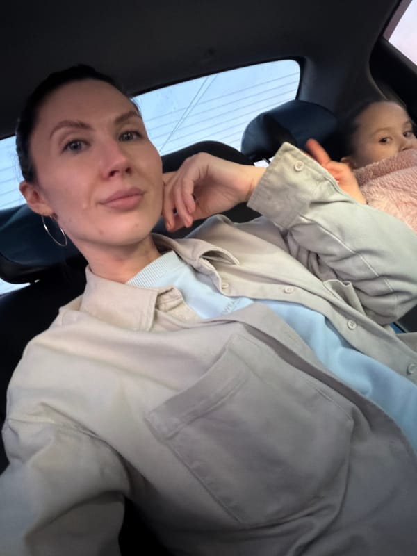 Woman and child spotted in vehicle interior in Perm