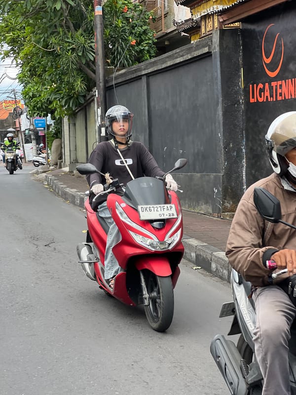 Morning scooter traffic documented in North Kuta, Indonesia