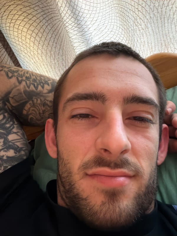 Man takes morning selfie on couch in Plovdiv