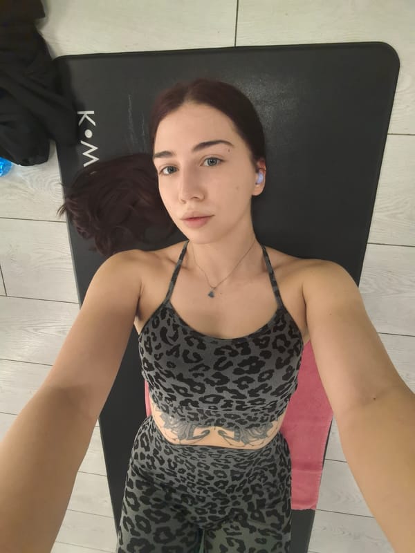 Woman exercises in home gym in Stara Zagora