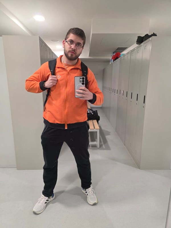Man in orange BTJ jacket spotted at multiple Plovdiv locations