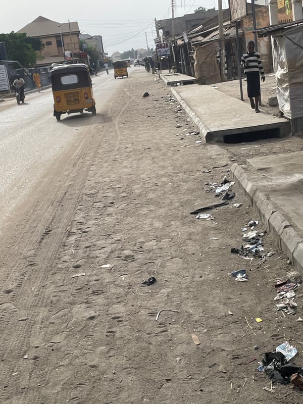 Morning street life documented in unidentified arid urban area