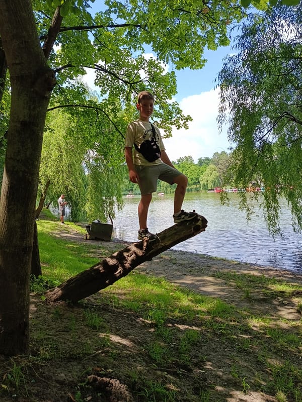 Afternoon at a Chișinău lake — paddle boats and shoreline paths
