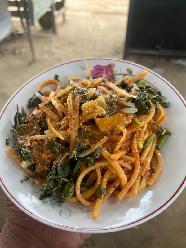 Noodle meal served and eaten outdoors in Geunteng, Indonesia