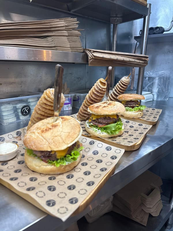 Gourmet burger meal documented at unknown food establishment