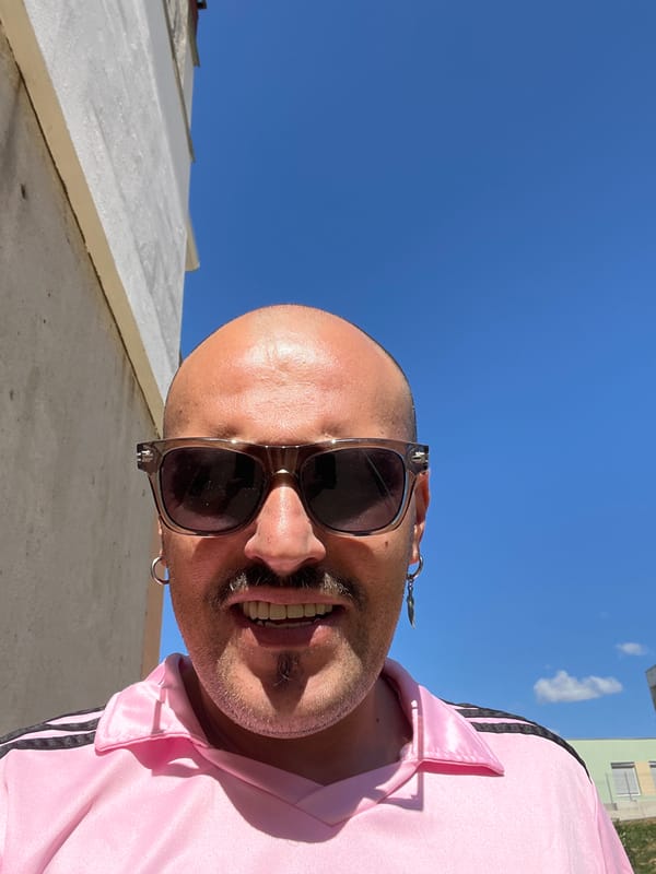 City skyline and street-level selfie on a clear morning