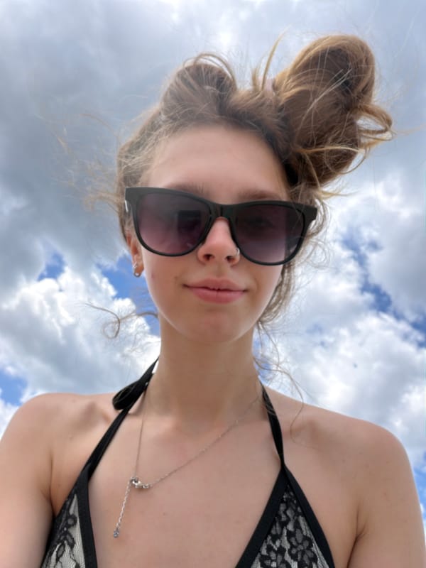 Lazy beach day with pier views and sandy selfies