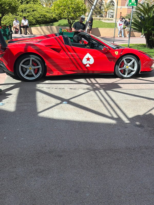 Red Ferrari with white spade spotted parked in Monaco