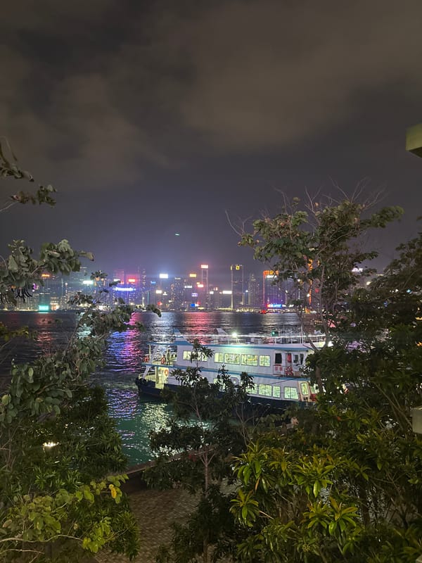 Hong Kong nighttime scenes documented across harbor and subway