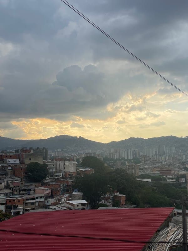 Urban skyline photographed under dramatic evening clouds