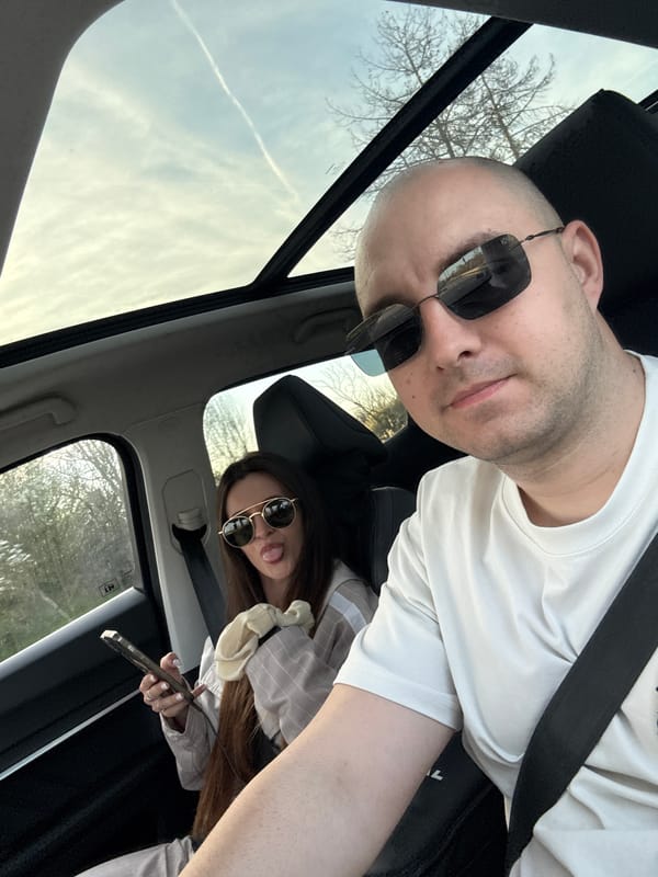 Couple takes selfies in car in Pobeda, Bulgaria