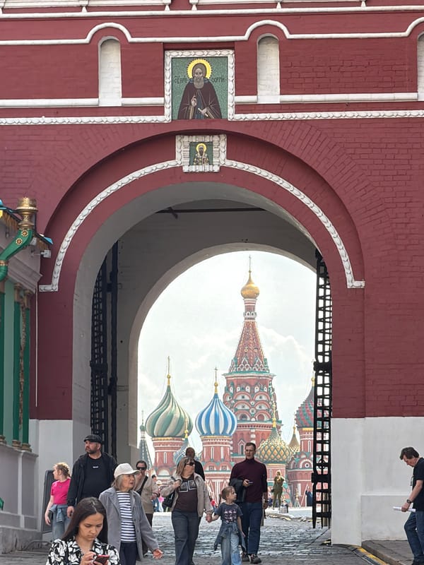 St. Basil's Cathedral photographed through ornate archway in Moscow