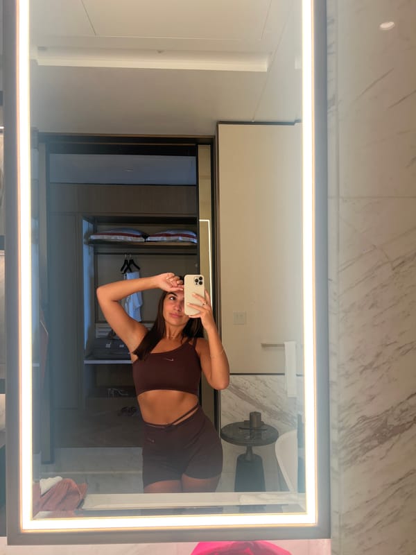 Woman takes morning workout selfies in luxury Dubai bathroom
