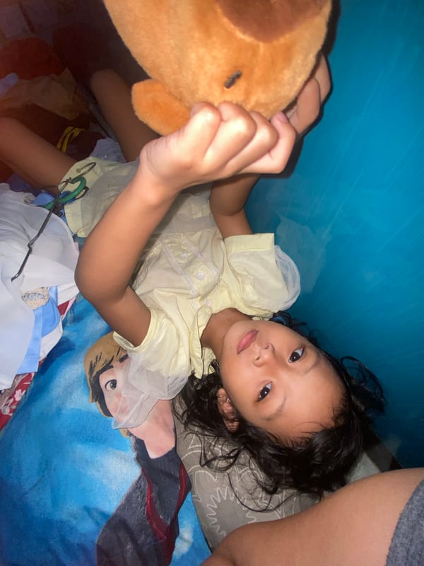 Child photographed in calm moment in Gelam, Indonesia