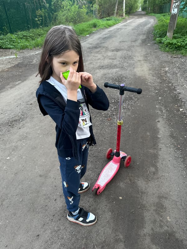 Family outing with children and scooter captured in Pushkino
