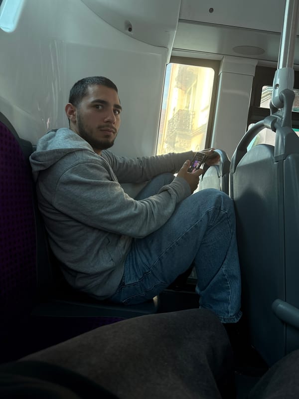 Young man rides public transport in Schiltigheim, France