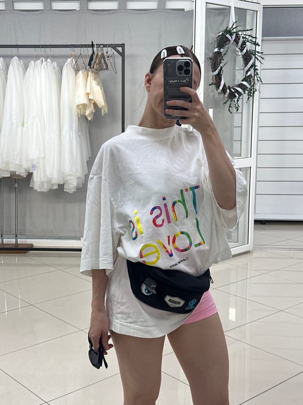 Women photograph themselves in Votkinsk clothing design studio