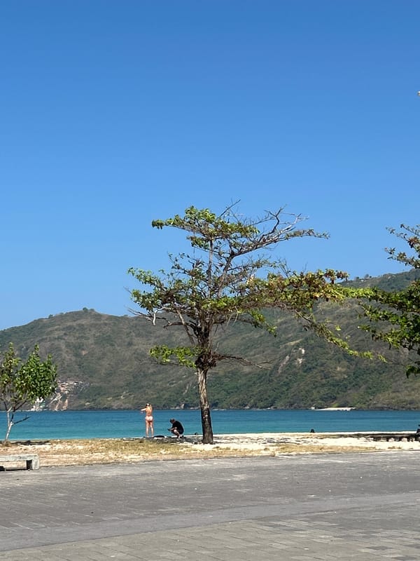 A sunny morning along Kuta Lombok's beach and promenade