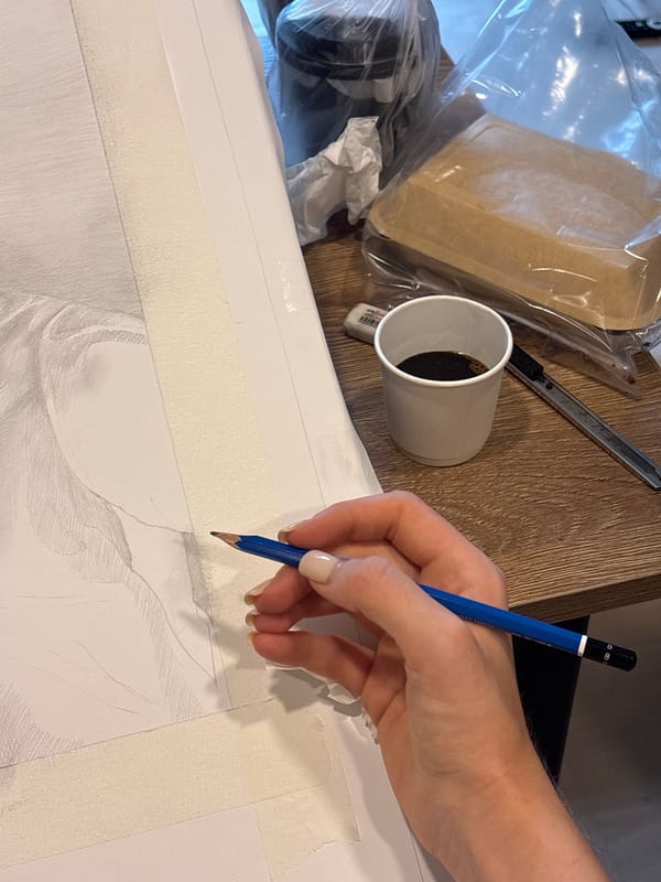 Artist creates intimate pencil drawing in Choeng Thale workspace
