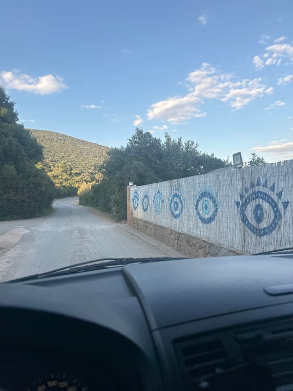 Stone wall with blue eye art spotted in Gošići
