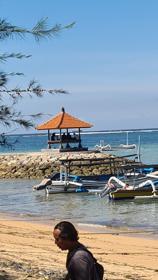 Quiet morning activity along Sanur Beach, Bali