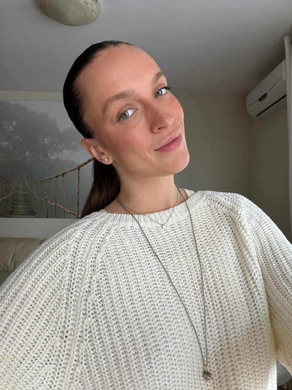 Woman takes selfies indoors in Budva, Montenegro