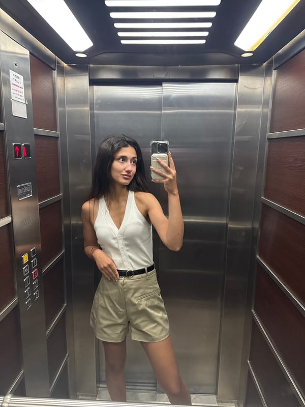 Woman takes selfies, apple tart prepared in Budva