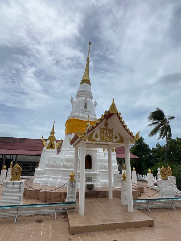 Inside a Ko Samui Buddhist temple complex and its hillside cemetery