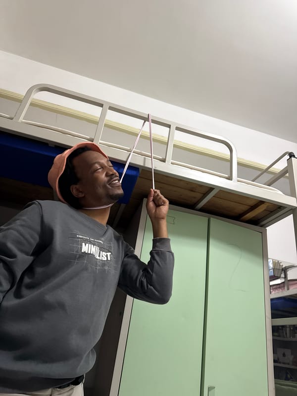 Dorm room moment in Daxing District, peach hat and pink straws