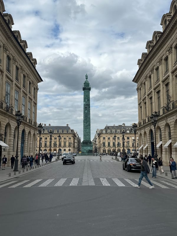 Witnesses document Place Vendôme under cloudy Paris skies