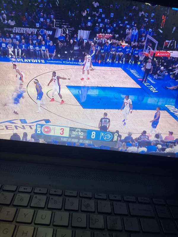 Basketball fan watches NBA playoffs on laptop in Tanzania