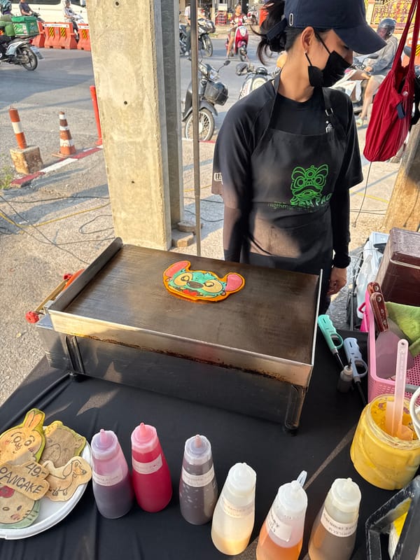 Character pancake vendor operates at Kathu street market
