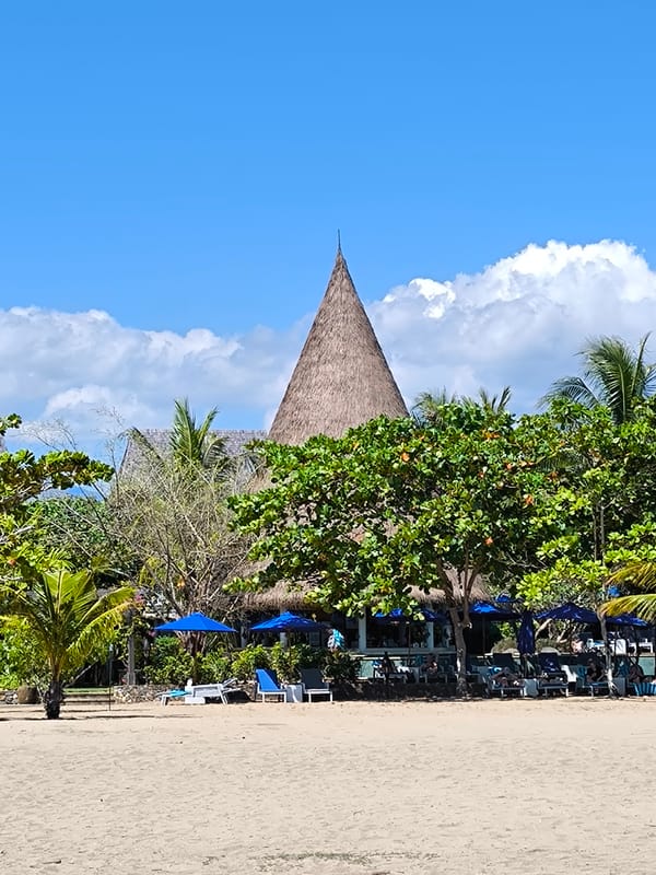 Labuan Bajo coastline: beaches, boats, and tropical resort views