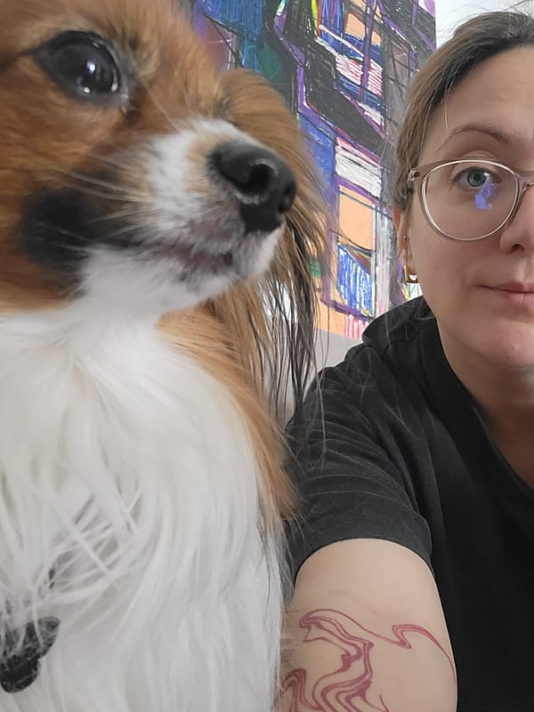 Person and dog captured in selfie in Budva